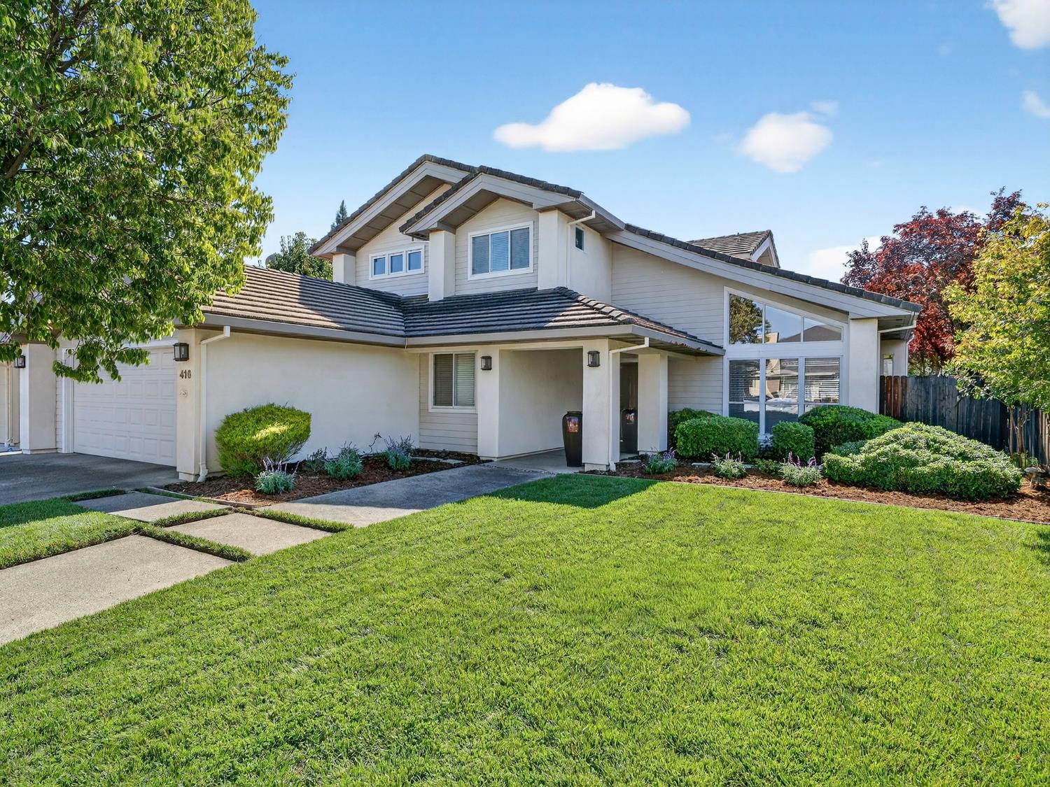 416 Merganser Place Davis, CA 95616 - Photo 46 of 46 a front view of a house with garden and patio