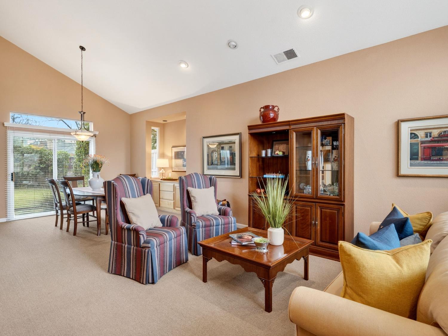 416 Merganser Place Davis, CA 95616 - Photo 5 of 46 a living room with furniture kitchen view and a large window