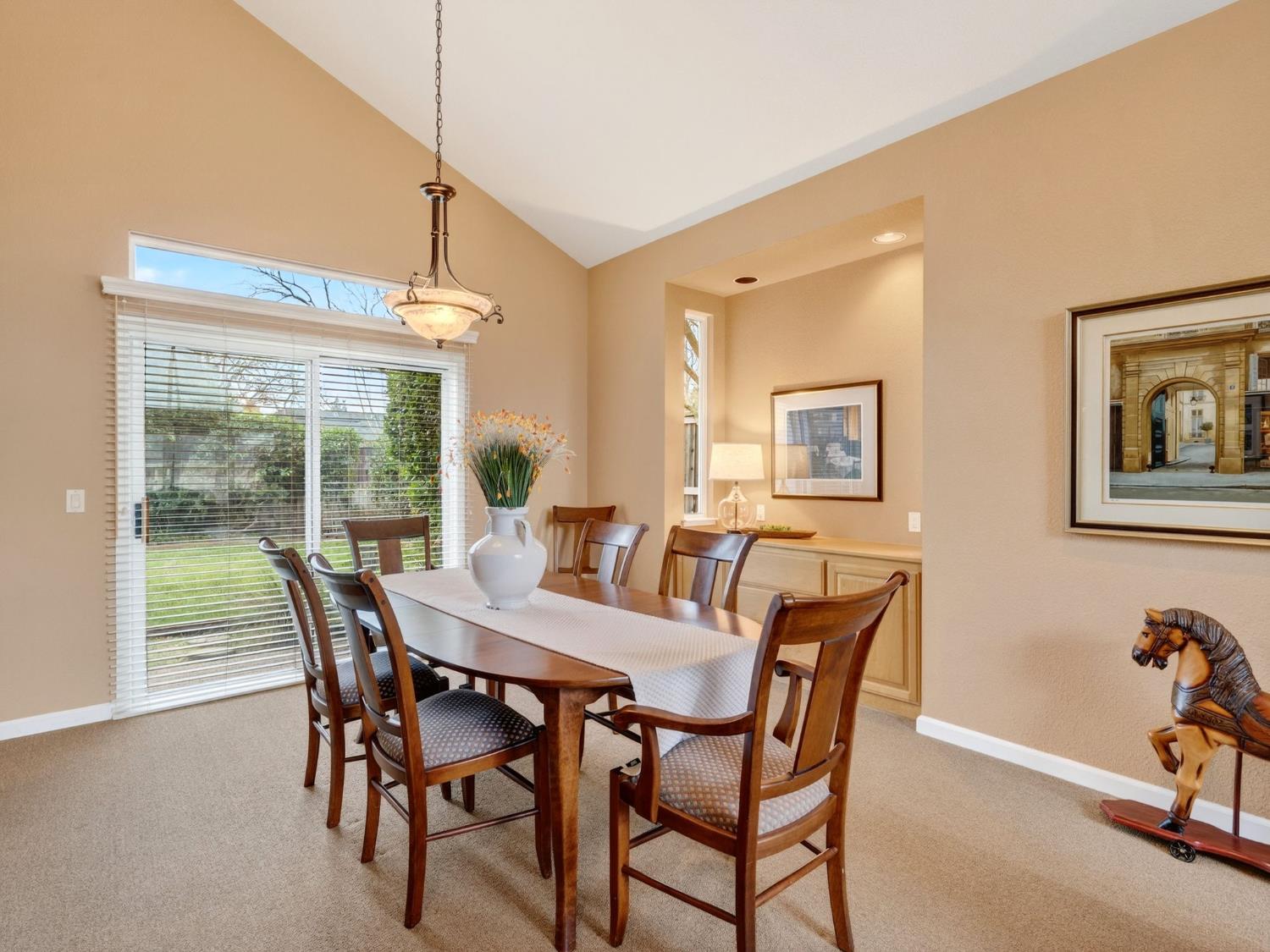 416 Merganser Place Davis, CA 95616 - Photo 7 of 46 a view of a dining room with furniture window and outside view