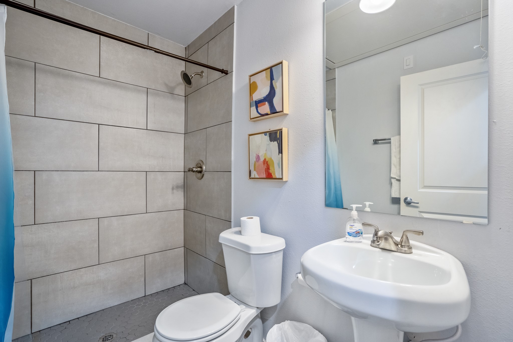 2518 Cleburne Street Houston, TX 77004 - Photo 12 of 24 a bathroom with a sink toilet and a mirror