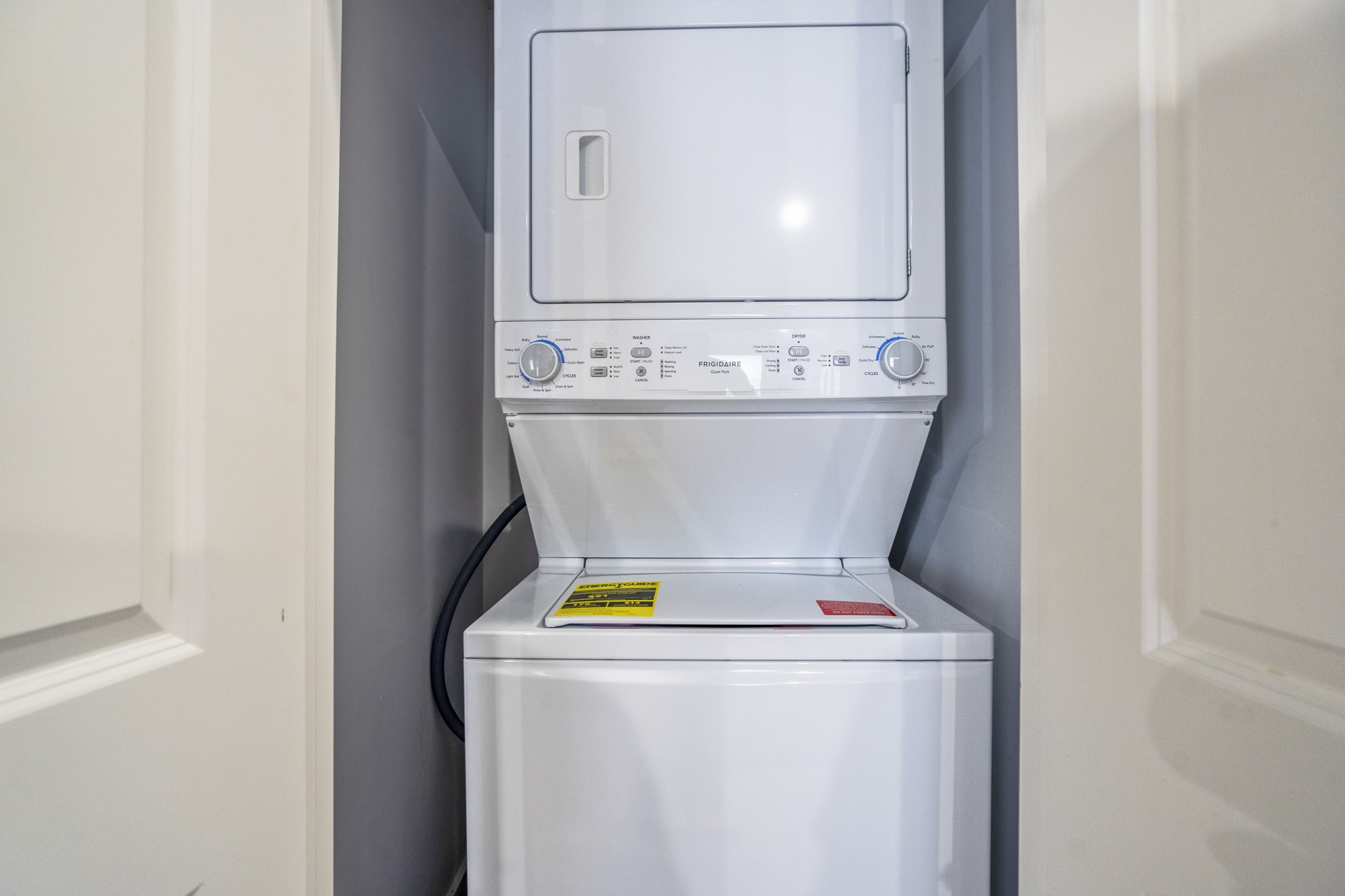 2518 Cleburne Street Houston, TX 77004 - Photo 15 of 24 a view of washer and dryer with wooden floor