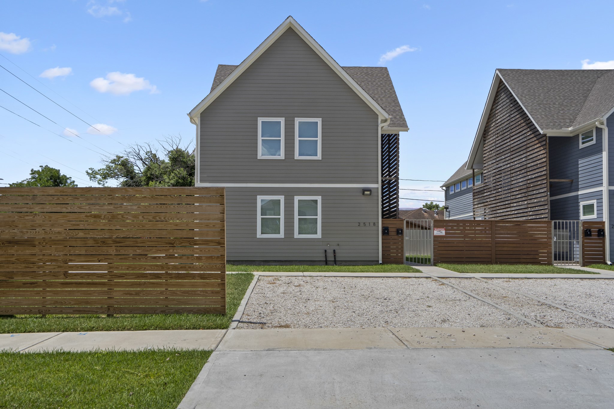2518 Cleburne Street Houston, TX 77004 - Photo 2 of 24 a front view of a house with a yard