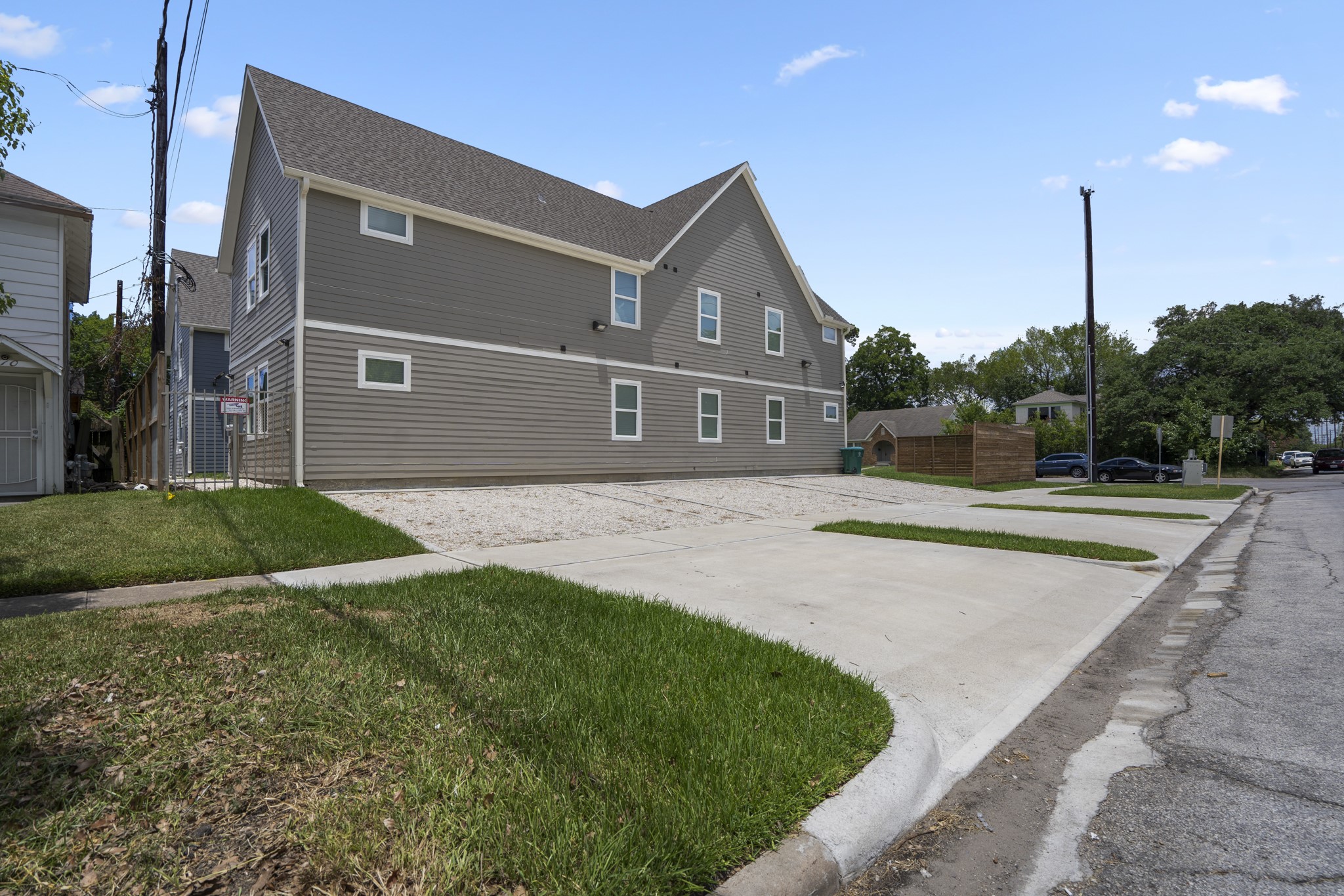 2518 Cleburne Street Houston, TX 77004 - Photo 4 of 24 a view of a house next to a big yard