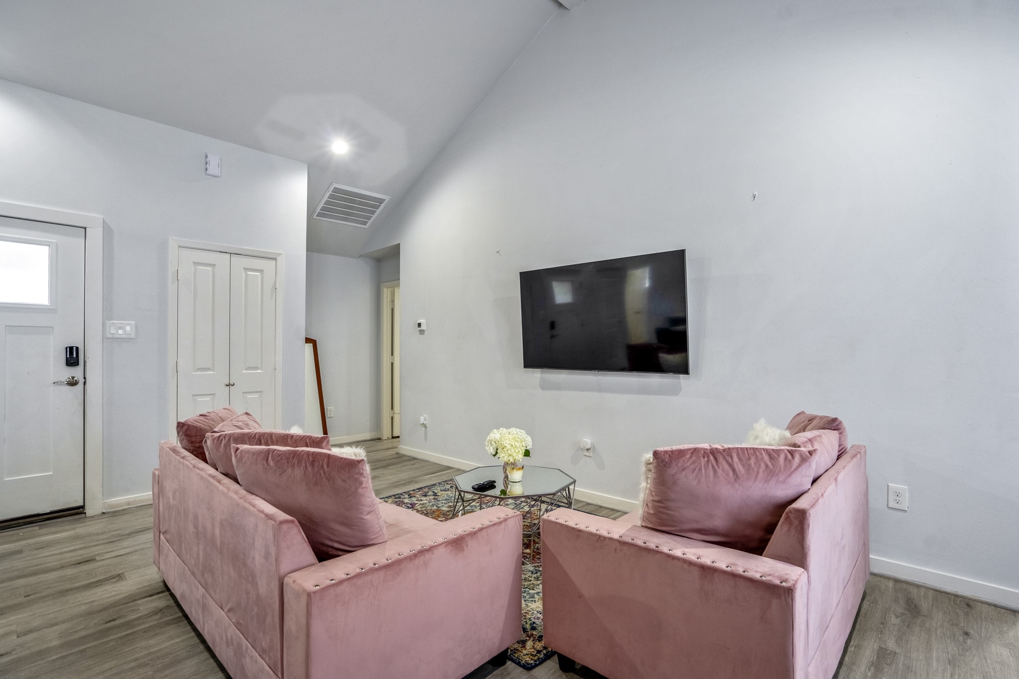 2518 Cleburne Street Houston, TX 77004 - Photo 8 of 24 a living room with furniture and a flat screen tv