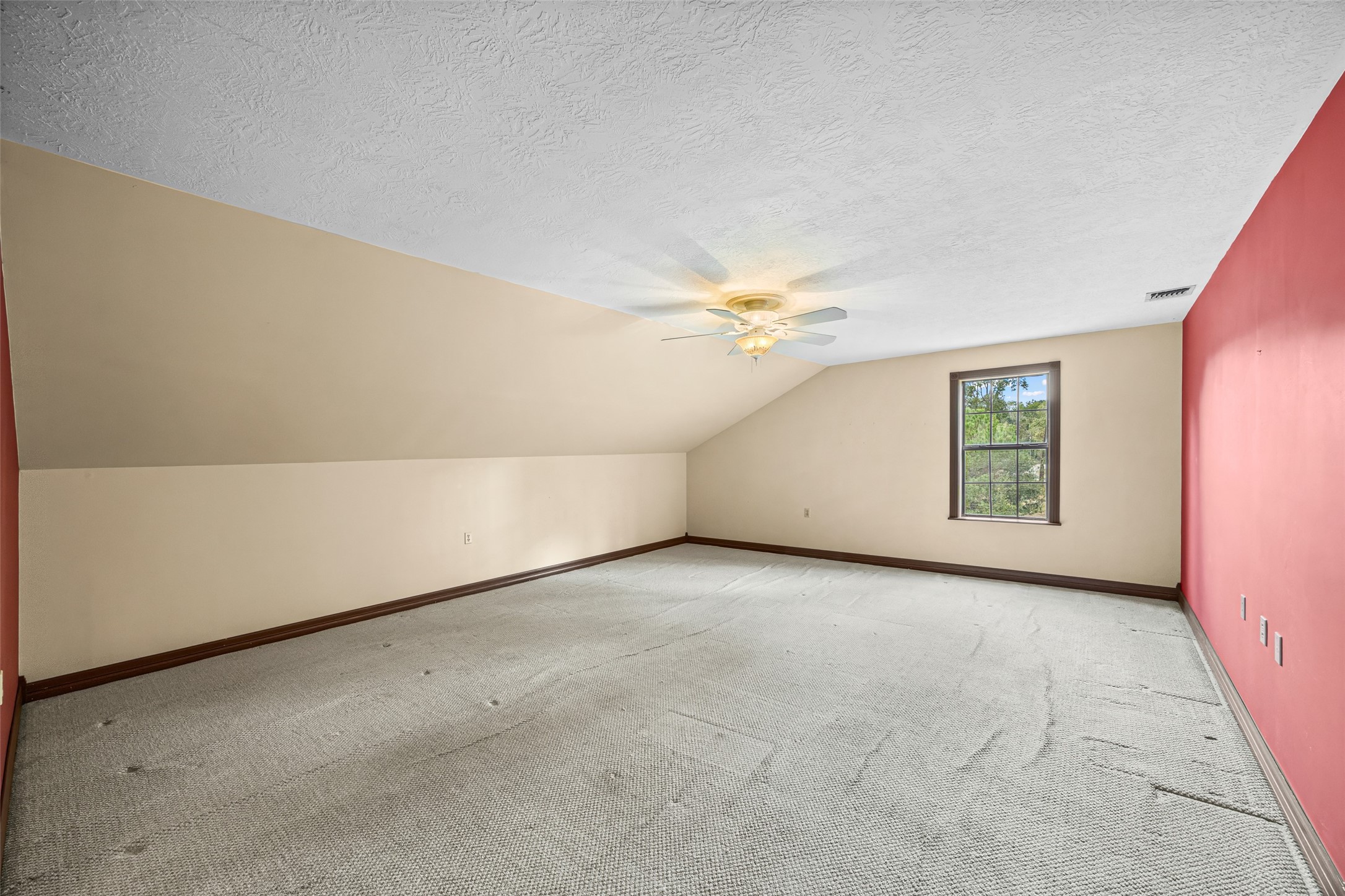 7 Northwood Country Road Huffman, TX 77336 - Photo 33 of 50 an empty room with a window