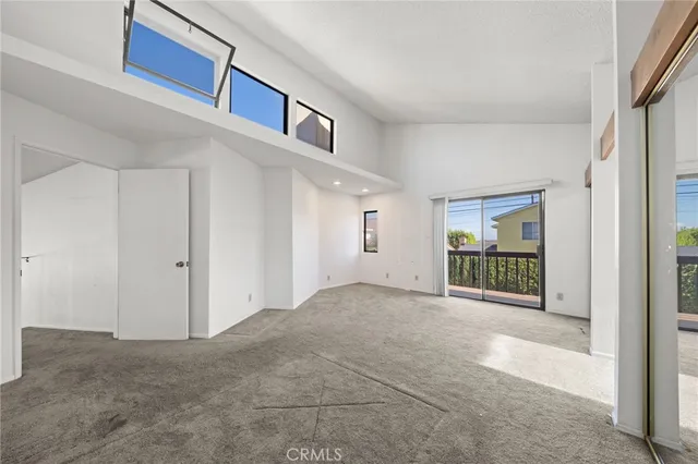 a view of a backyard with potted plants