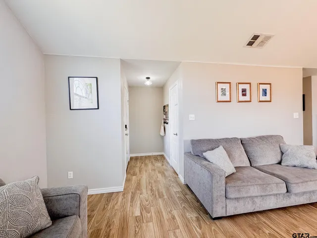a living room with furniture and a couch