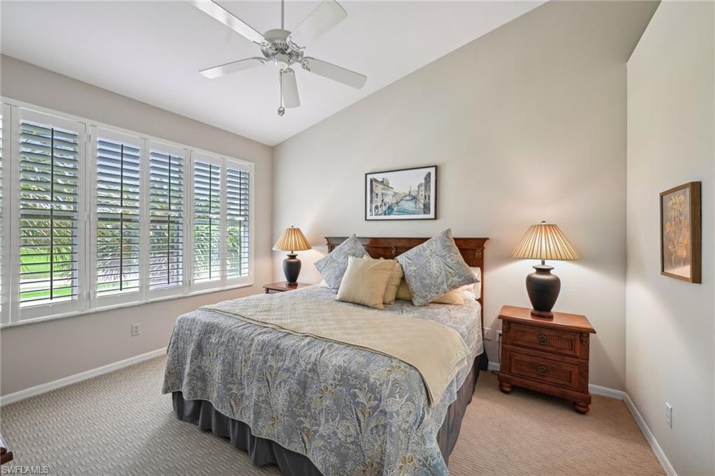 9030 Spring Run Boulevard, Unit 508 Estero, FL 34135 - Photo 23 of 50 a bedroom with a bed and window