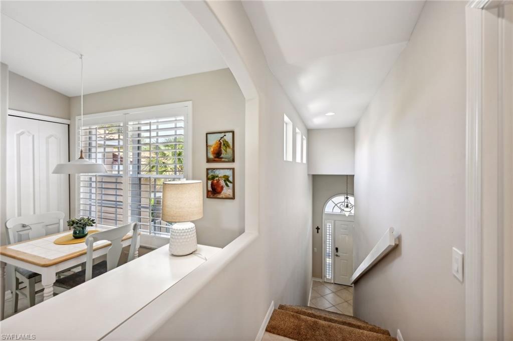 9030 Spring Run Boulevard, Unit 508 Estero, FL 34135 - Photo 4 of 50 a living room with furniture and a window