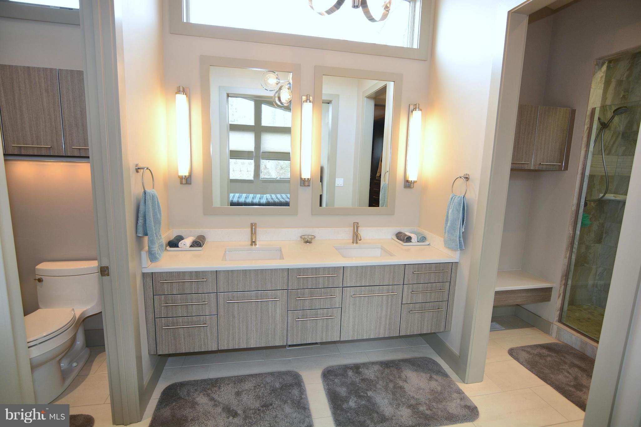 1252 Fenwick Garth Arnold, MD 21012 - Photo 12 of 30 a bathroom with a tub sink and mirror