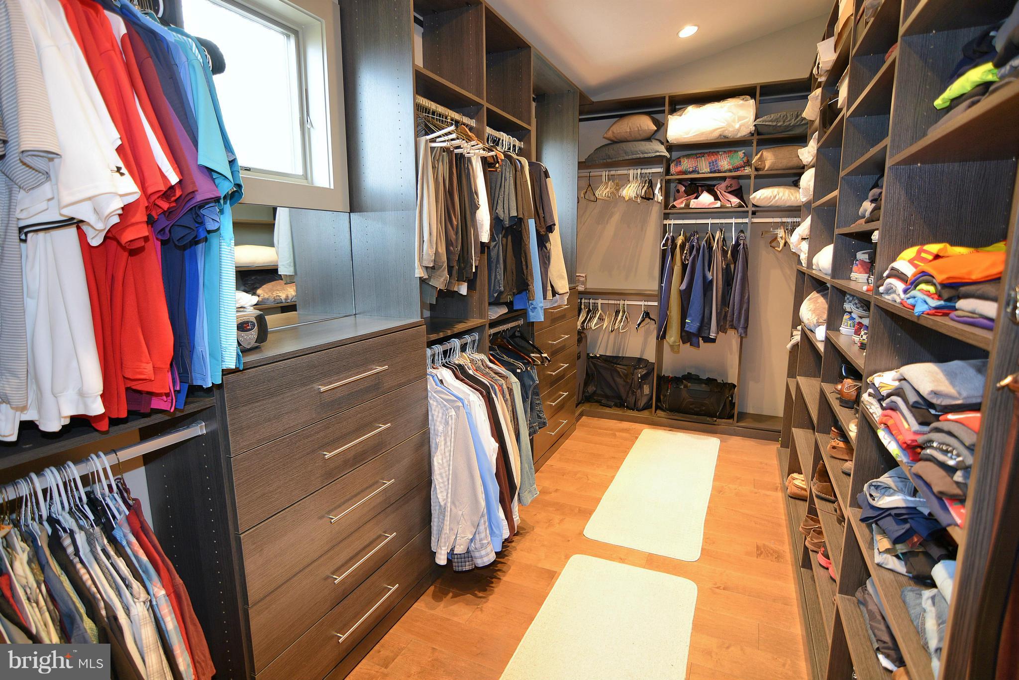 1252 Fenwick Garth Arnold, MD 21012 - Photo 13 of 30 a view of walk in closet with clothes and shoes