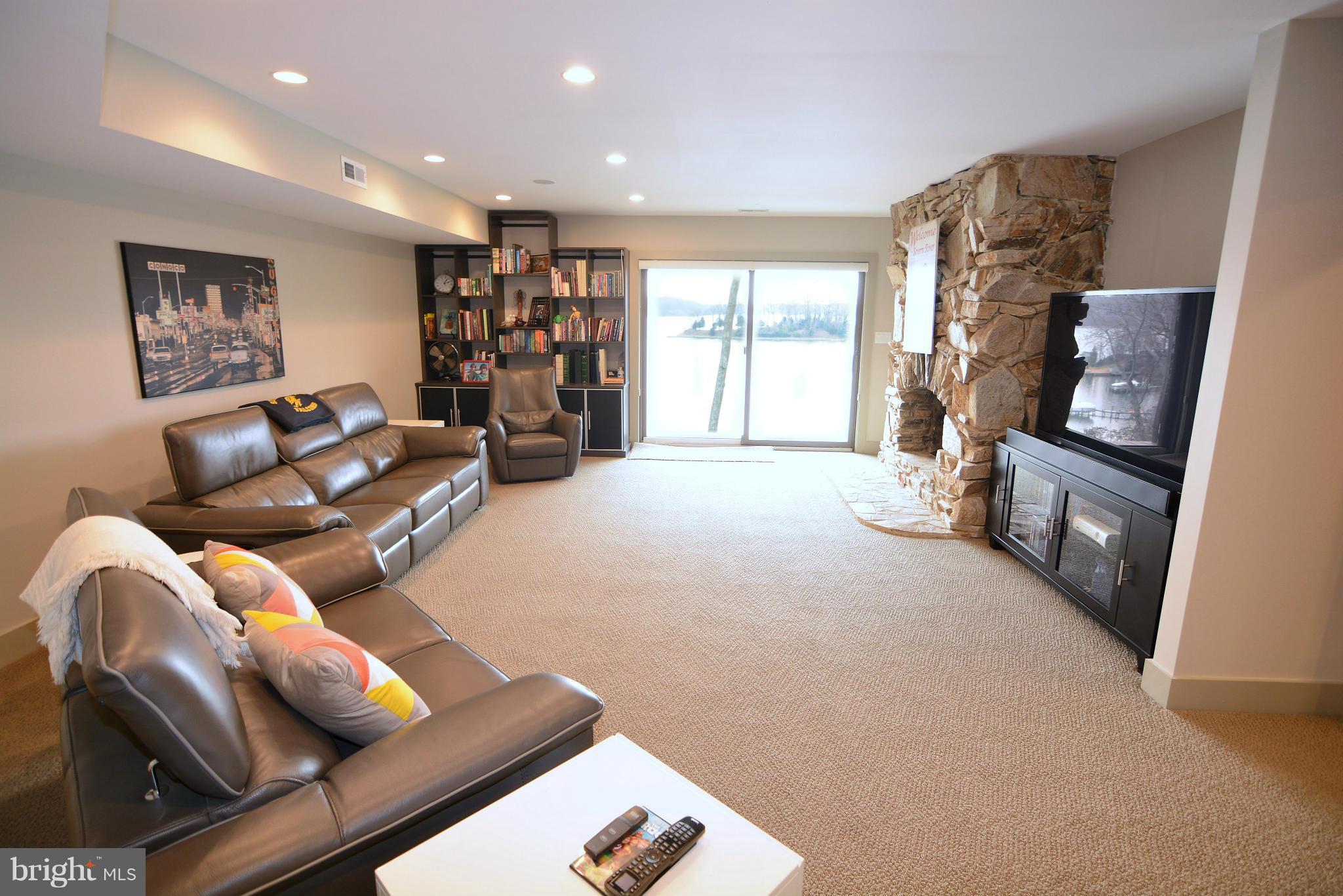 1252 Fenwick Garth Arnold, MD 21012 - Photo 17 of 30 a living room with furniture and a flat screen tv