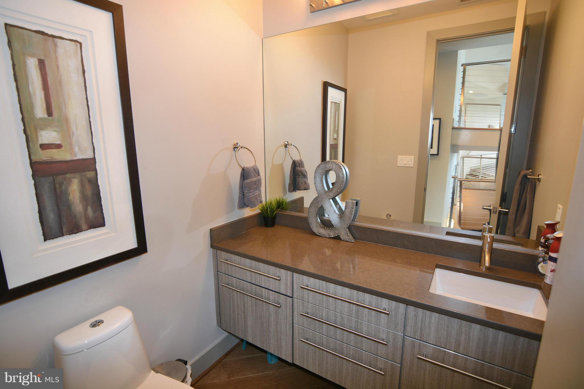 1252 Fenwick Garth Arnold, MD 21012 - Photo 18 of 30 a bathroom with a sink and a mirror
