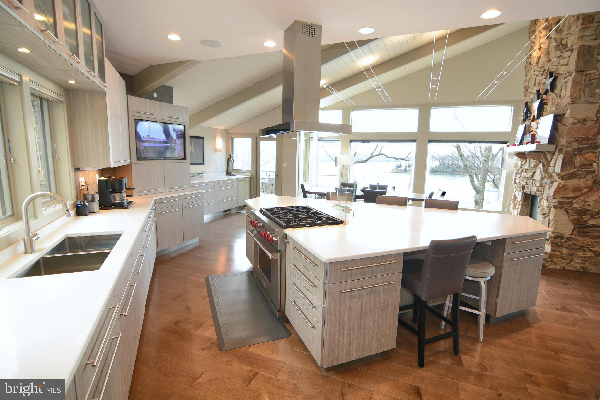 1252 Fenwick Garth Arnold, MD 21012 - Photo 3 of 30 a kitchen with a sink a counter top space and appliances