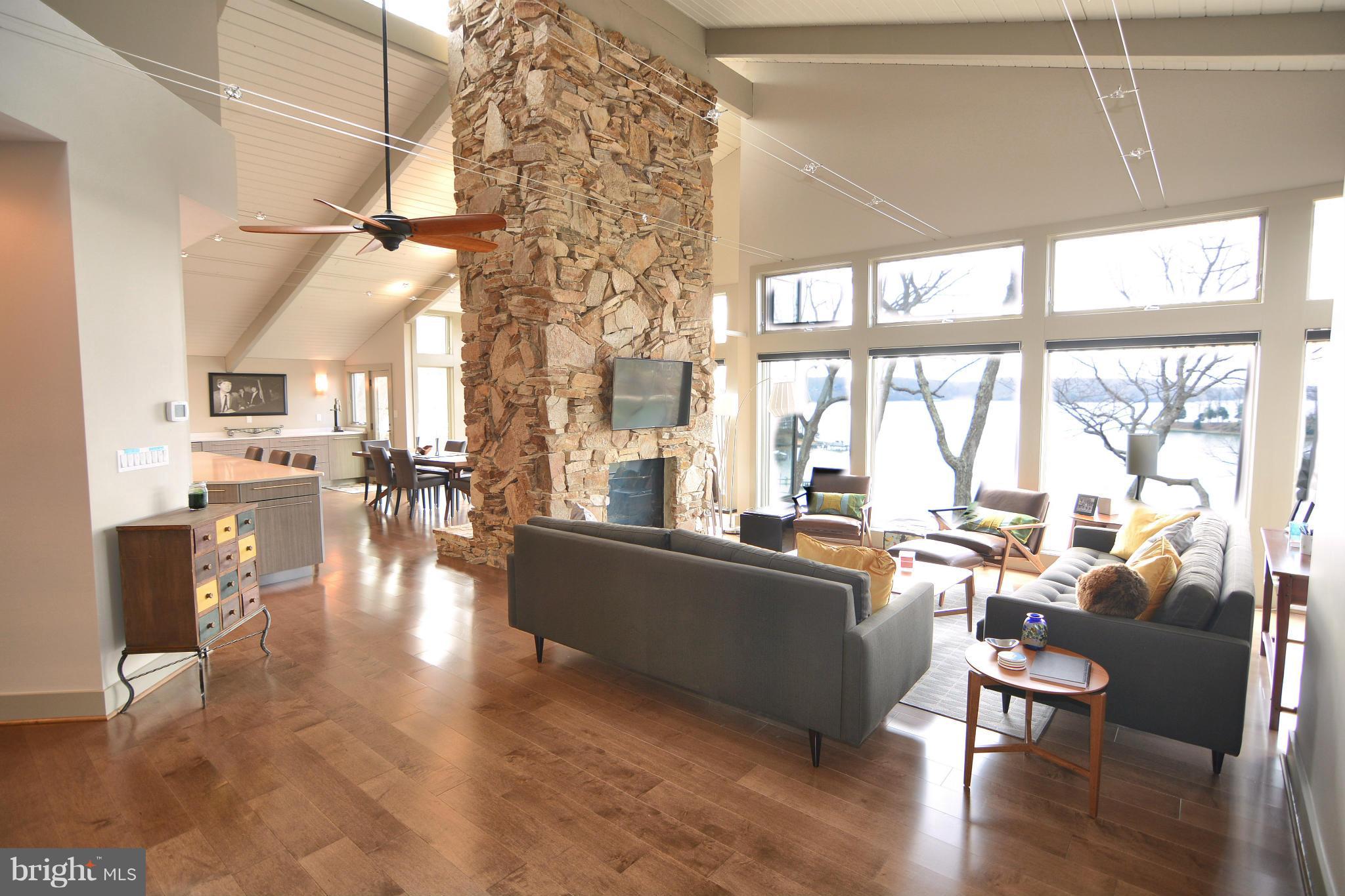 1252 Fenwick Garth Arnold, MD 21012 - Photo 7 of 30 a living room with fireplace furniture and a large window