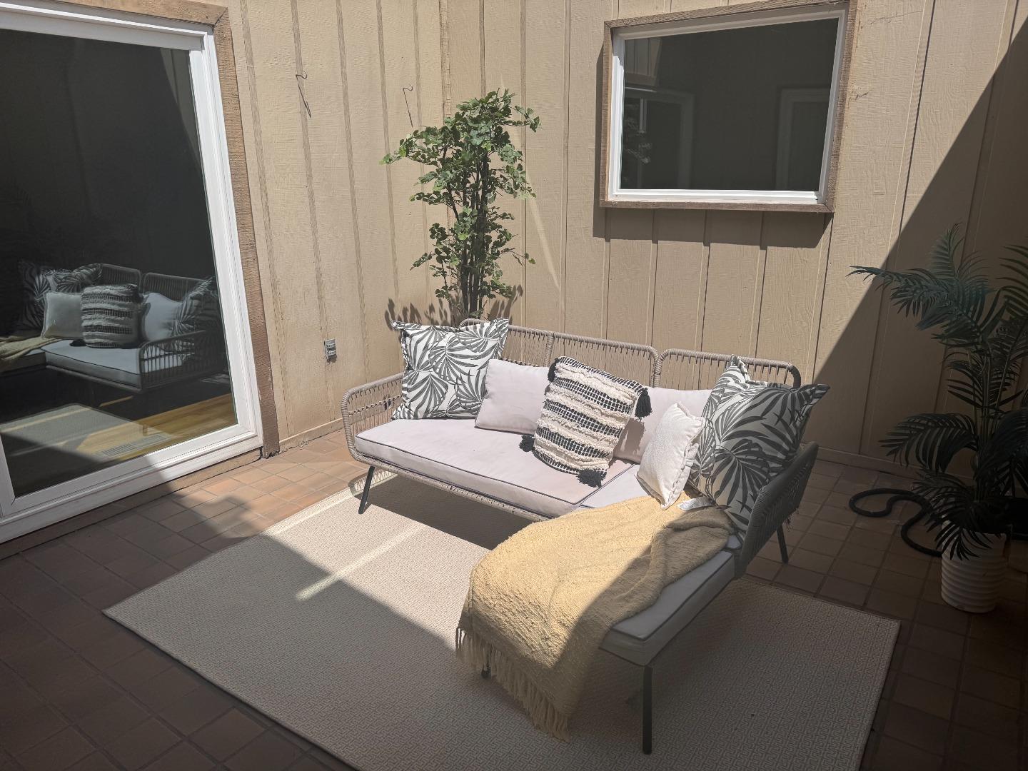 14220 Mountain Quail Road Salinas, CA 93908 - Photo 11 of 74 a living room with furniture and a potted plant