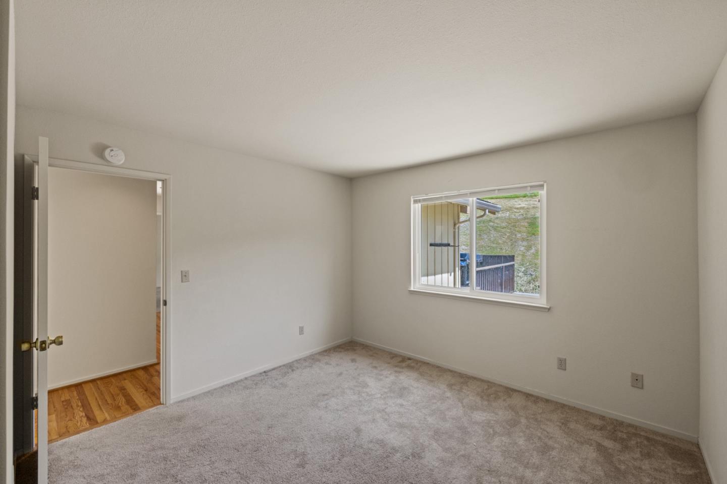 14220 Mountain Quail Road Salinas, CA 93908 - Photo 26 of 74 an empty room with windows and closet
