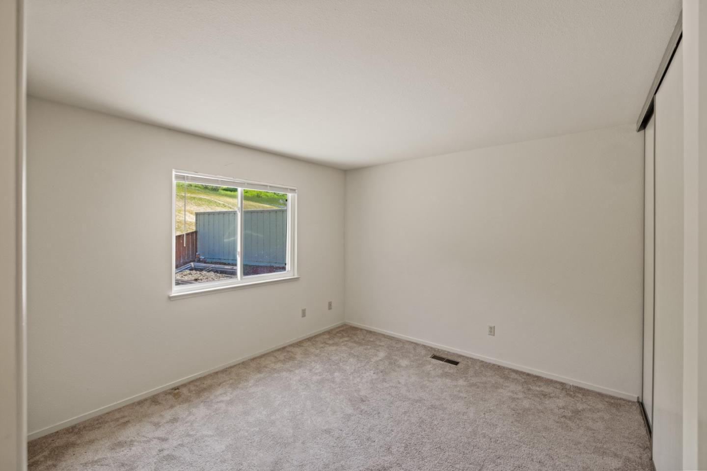 14220 Mountain Quail Road Salinas, CA 93908 - Photo 28 of 74 an empty room with a window