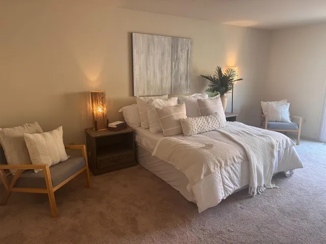 a view of a livingroom with wooden floor