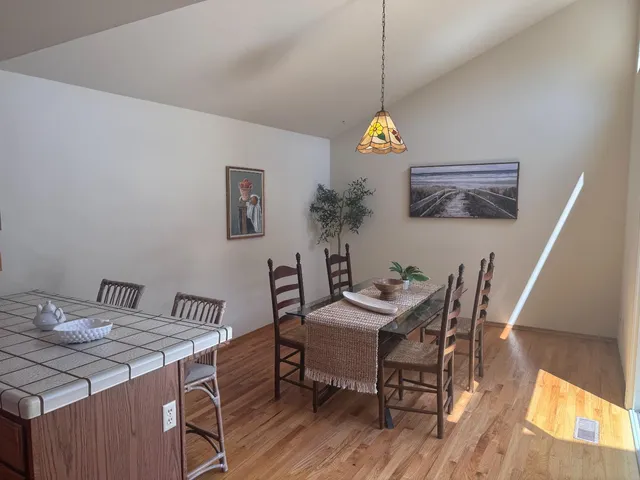 a living room with a fireplace and a window
