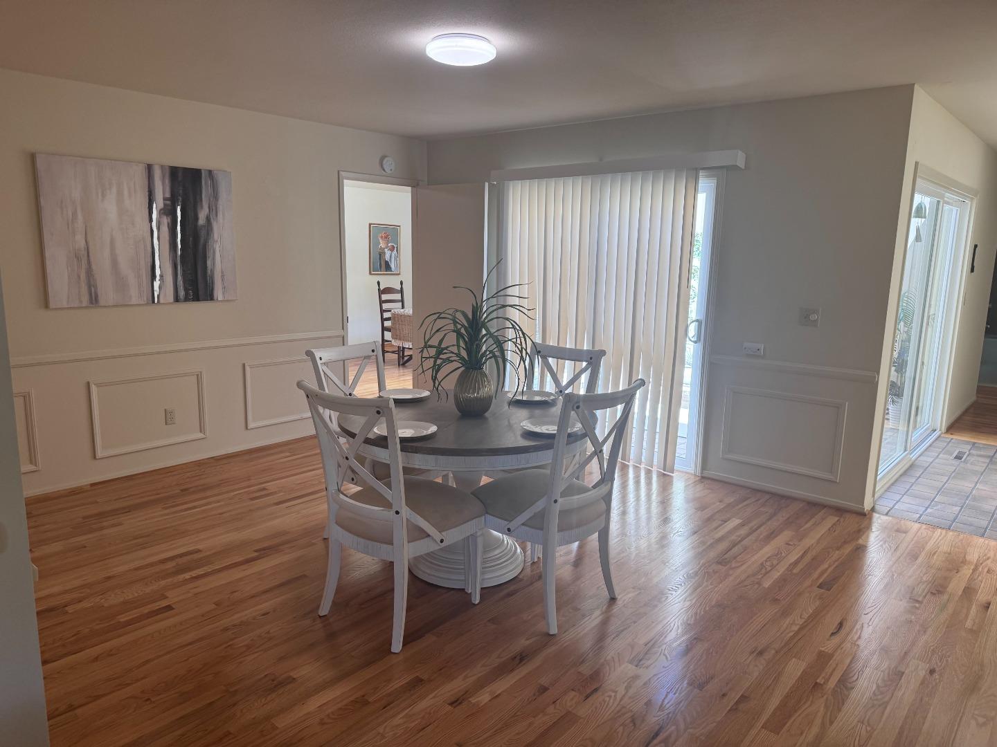 14220 Mountain Quail Road Salinas, CA 93908 - Photo 48 of 74 a view of a dining room with furniture and wooden floor