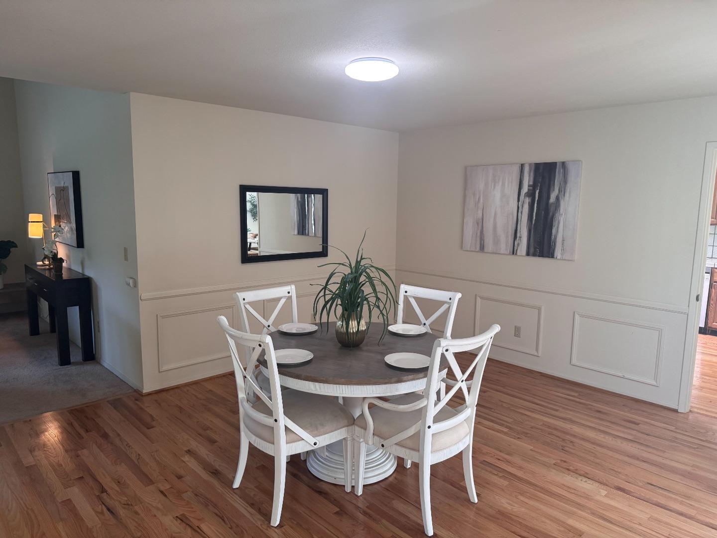 14220 Mountain Quail Road Salinas, CA 93908 - Photo 50 of 74 a view of a dining room with furniture and wooden floor