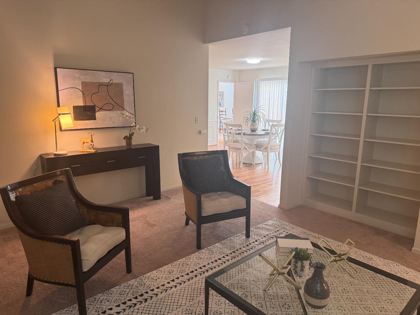 14220 Mountain Quail Road Salinas, CA 93908 - Photo 53 of 74 a chair and a table in a room