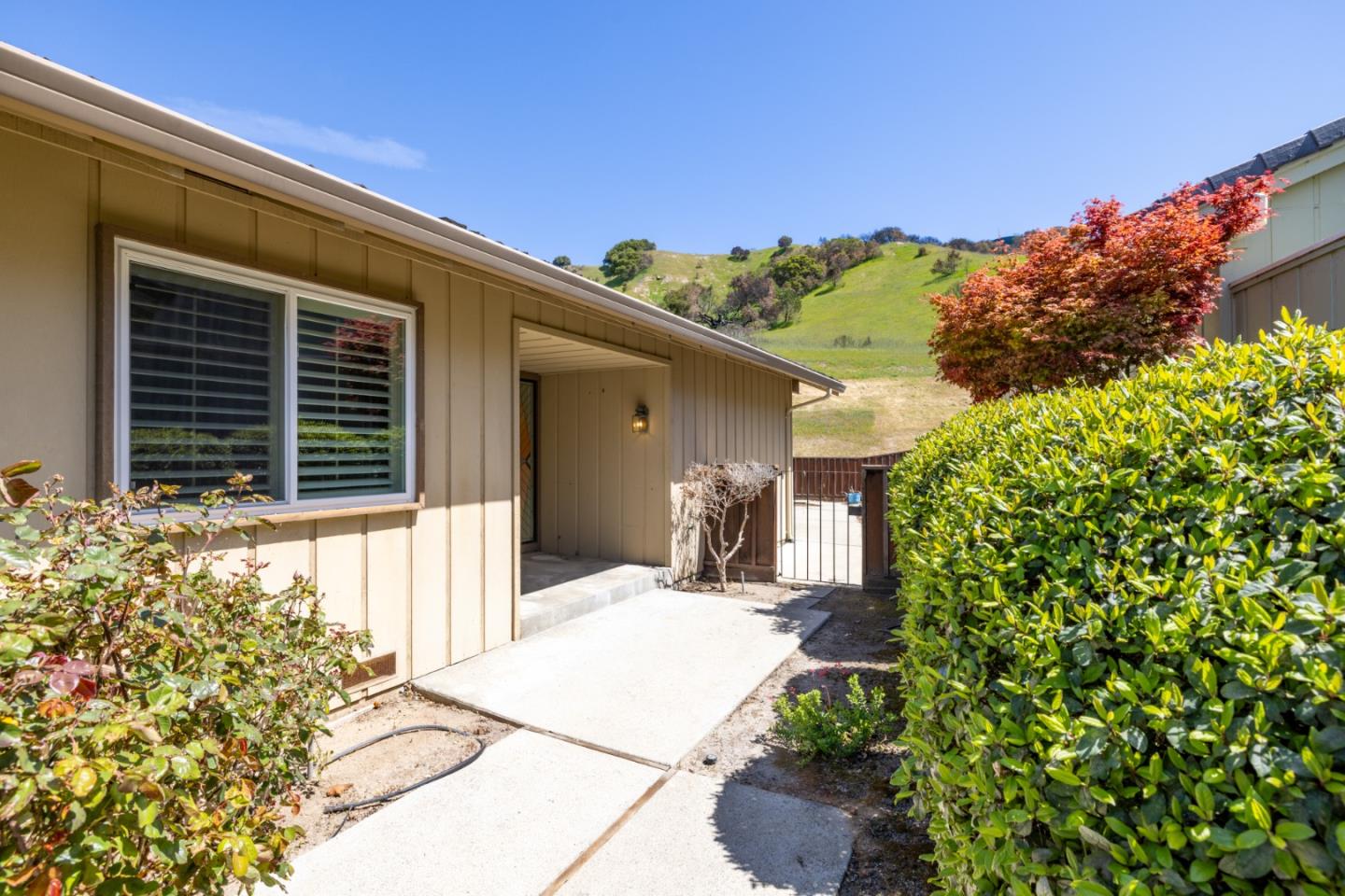 14220 Mountain Quail Road Salinas, CA 93908 - Photo 65 of 74 a front view of a house with a yard