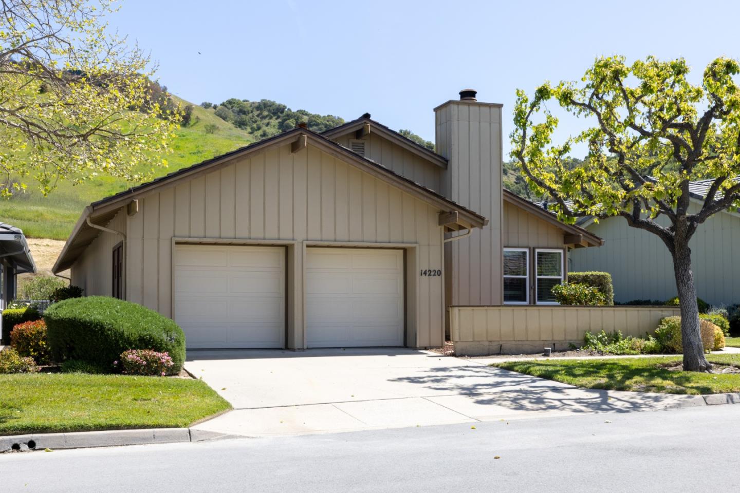 14220 Mountain Quail Road Salinas, CA 93908 - Photo 72 of 74 a front view of a house with a garden and plants
