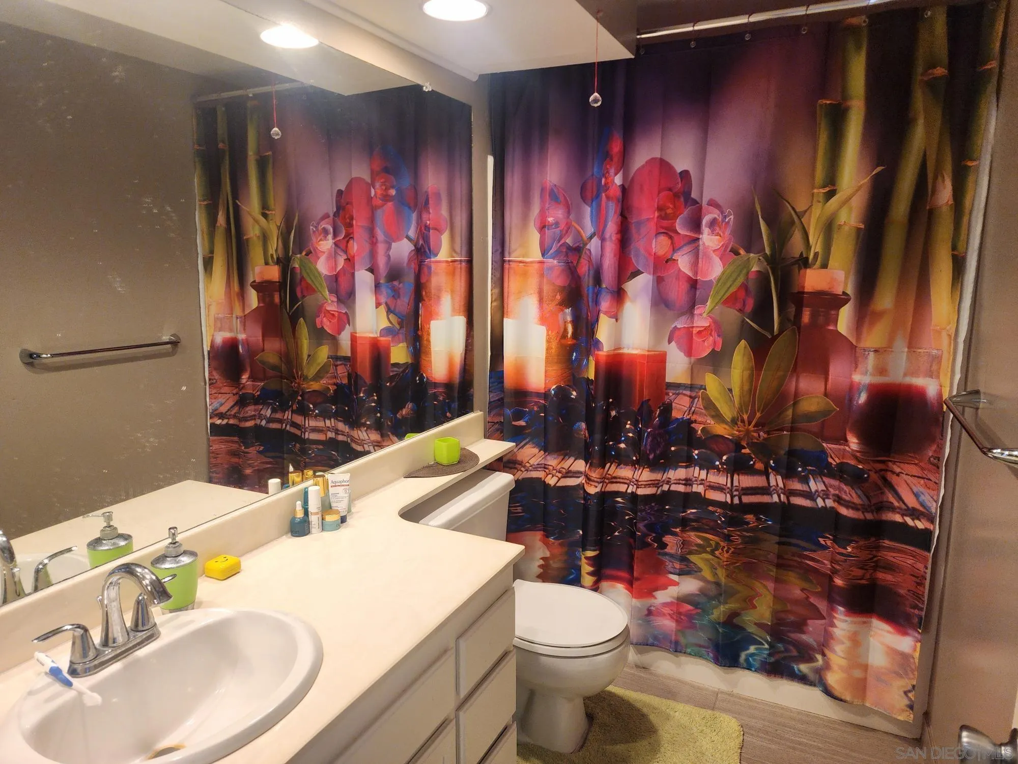 2332 Summerhill Drive Encinitas, CA 92024 - Photo 12 of 28 a bathroom with a sink toilet and shower