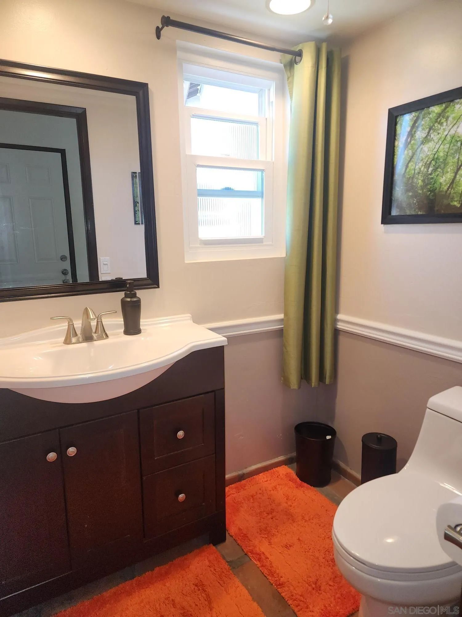 2332 Summerhill Drive Encinitas, CA 92024 - Photo 15 of 28 a bathroom with 2 sink and a mirror