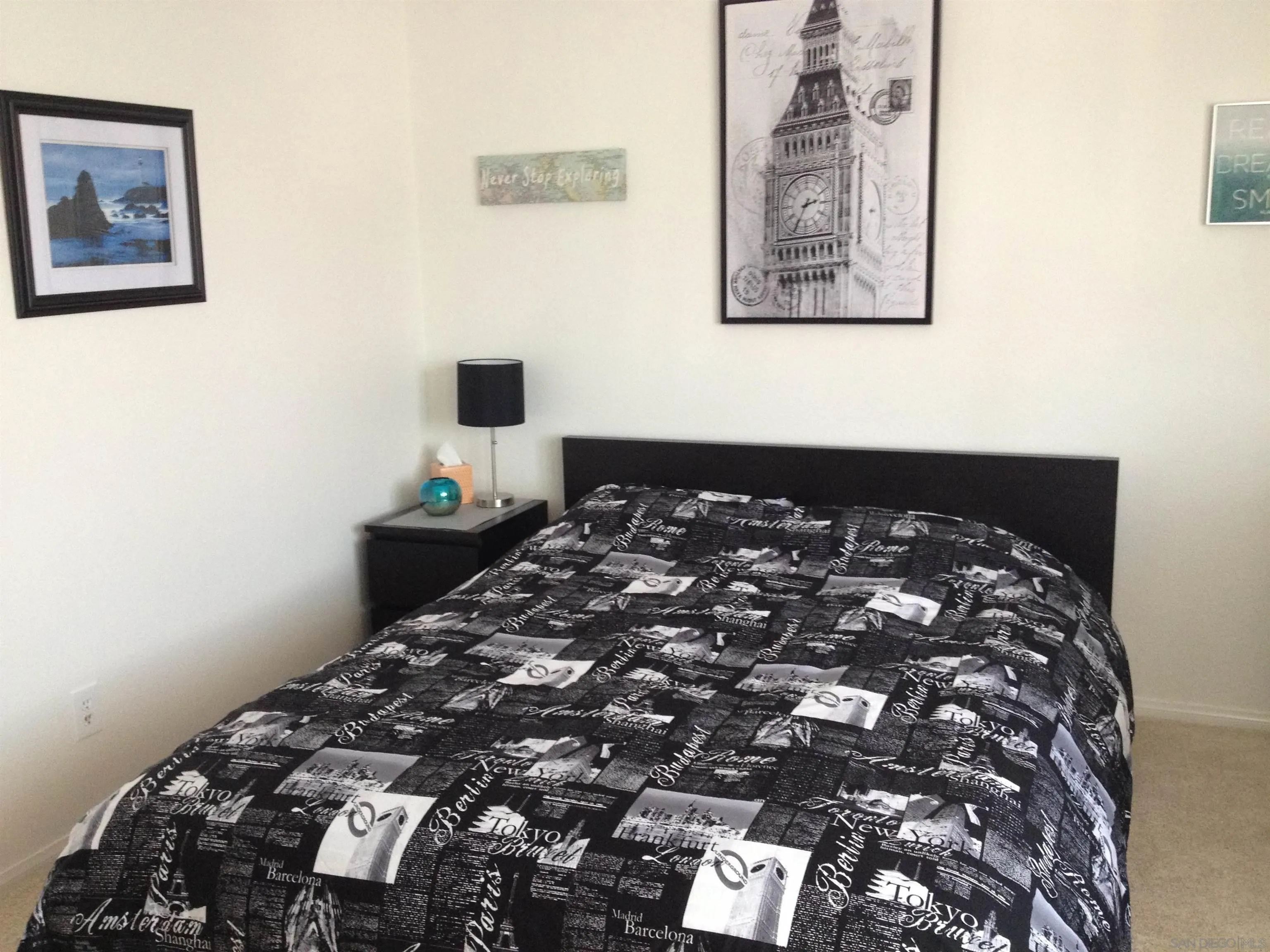 2332 Summerhill Drive Encinitas, CA 92024 - Photo 18 of 28 a large bed sitting in a bedroom next to a window