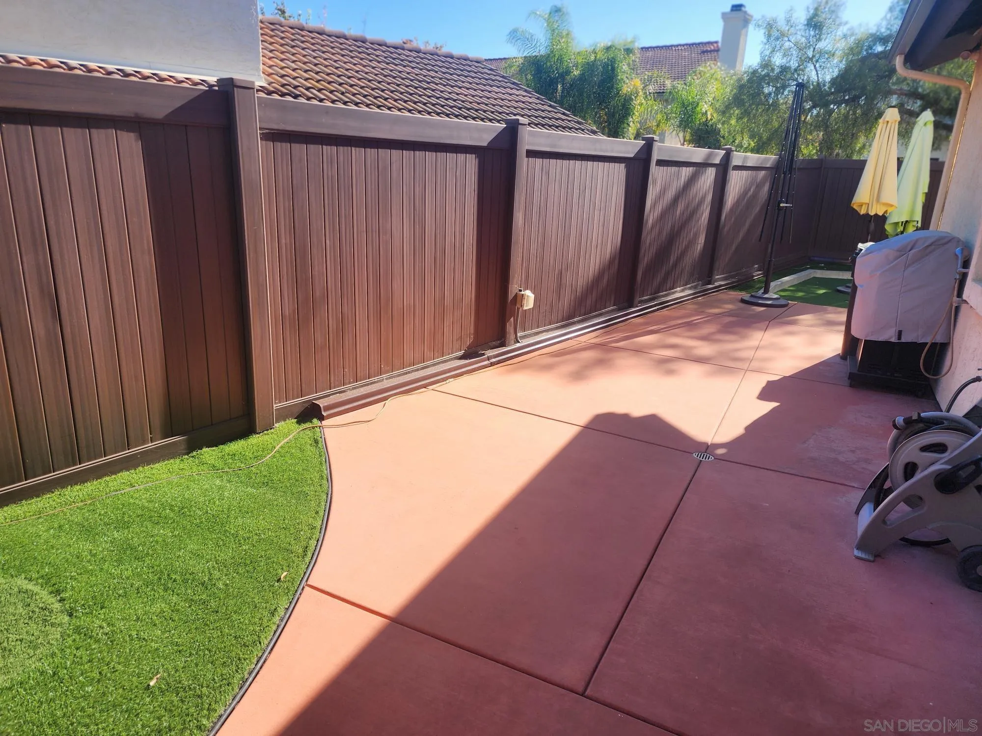 2332 Summerhill Drive Encinitas, CA 92024 - Photo 3 of 28 a backyard of a house with wooden fence
