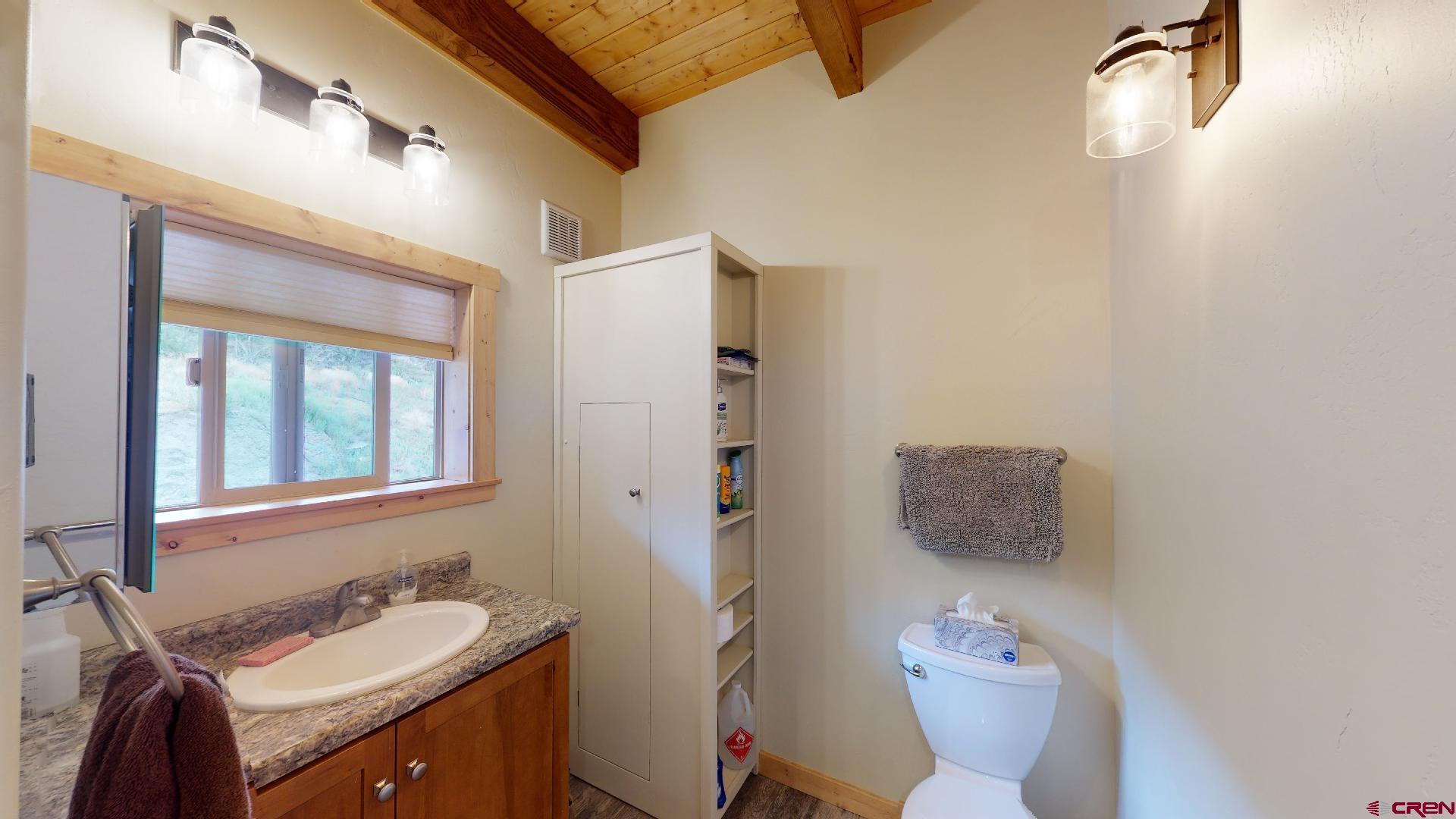 16800 Grange Road Paonia, CO 81428 - Photo 17 of 38 a bathroom with a sink and a toilet