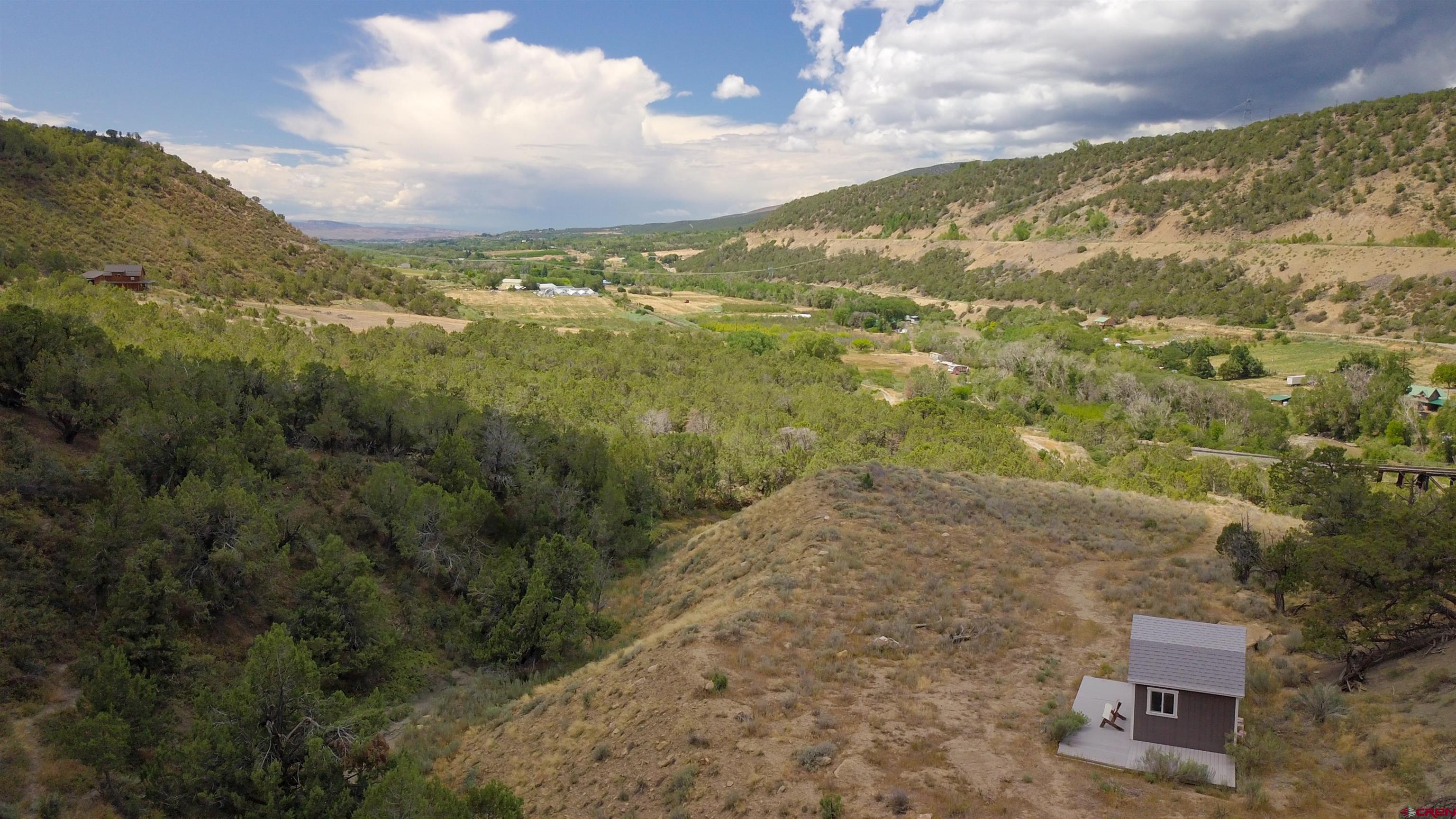 16800 Grange Road Paonia, CO 81428 - Photo 27 of 38 a view of a city with mountains in the background