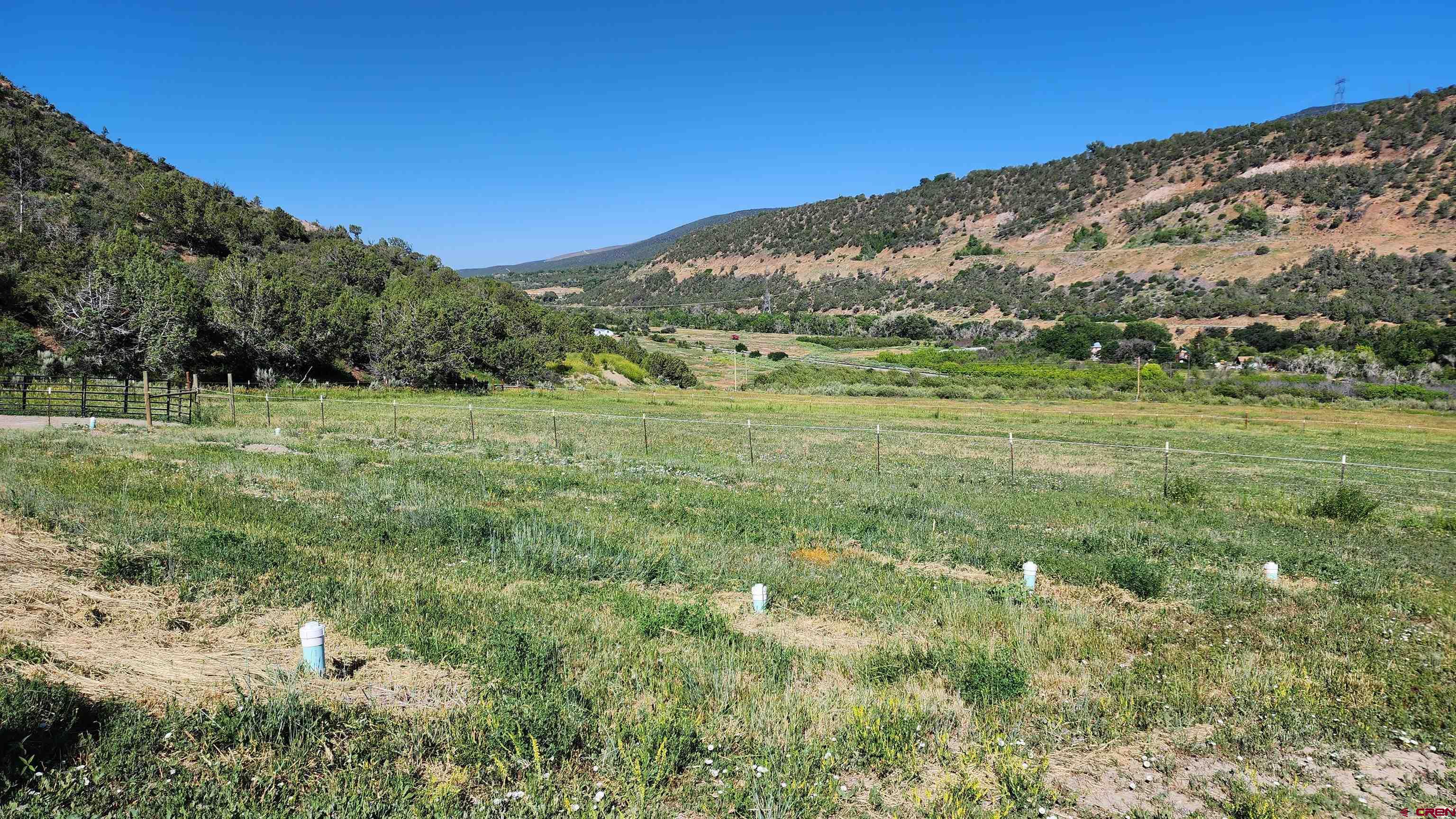 16800 Grange Road Paonia, CO 81428 - Photo 29 of 38 a view of a large building with a yard