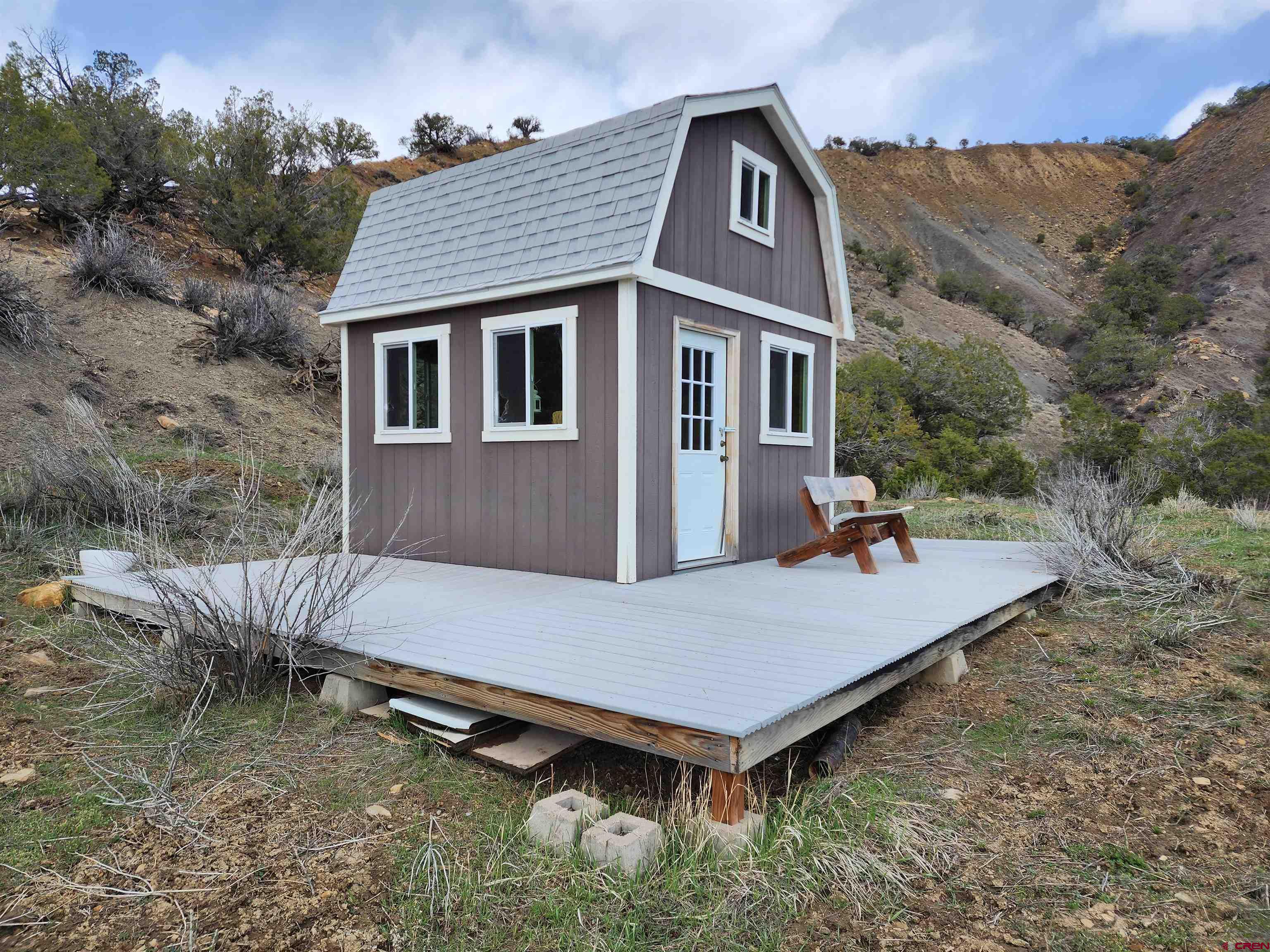 16800 Grange Road Paonia, CO 81428 - Photo 32 of 38 a view of a house with pool and a yard