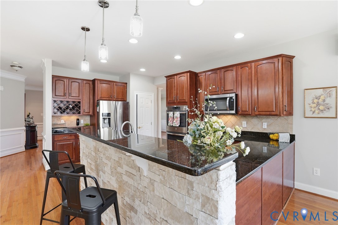 4649 Jennway Loop Moseley, VA 23120 - Photo 14 of 69 Stone accent on bar top