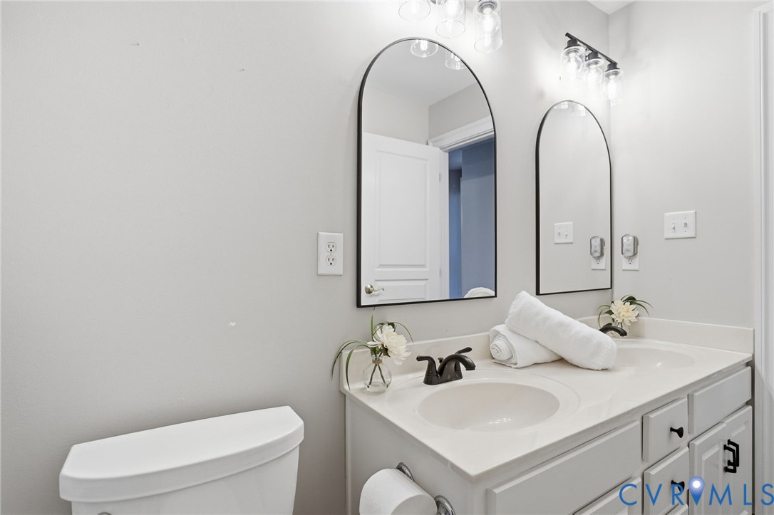 4649 Jennway Loop Moseley, VA 23120 - Photo 38 of 69 Freshly painted cabinets and all new mirrors