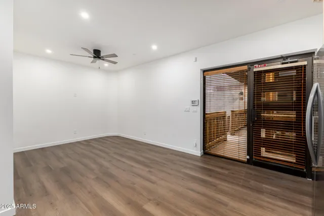 a view of kitchen with refrigerator microwave and stove