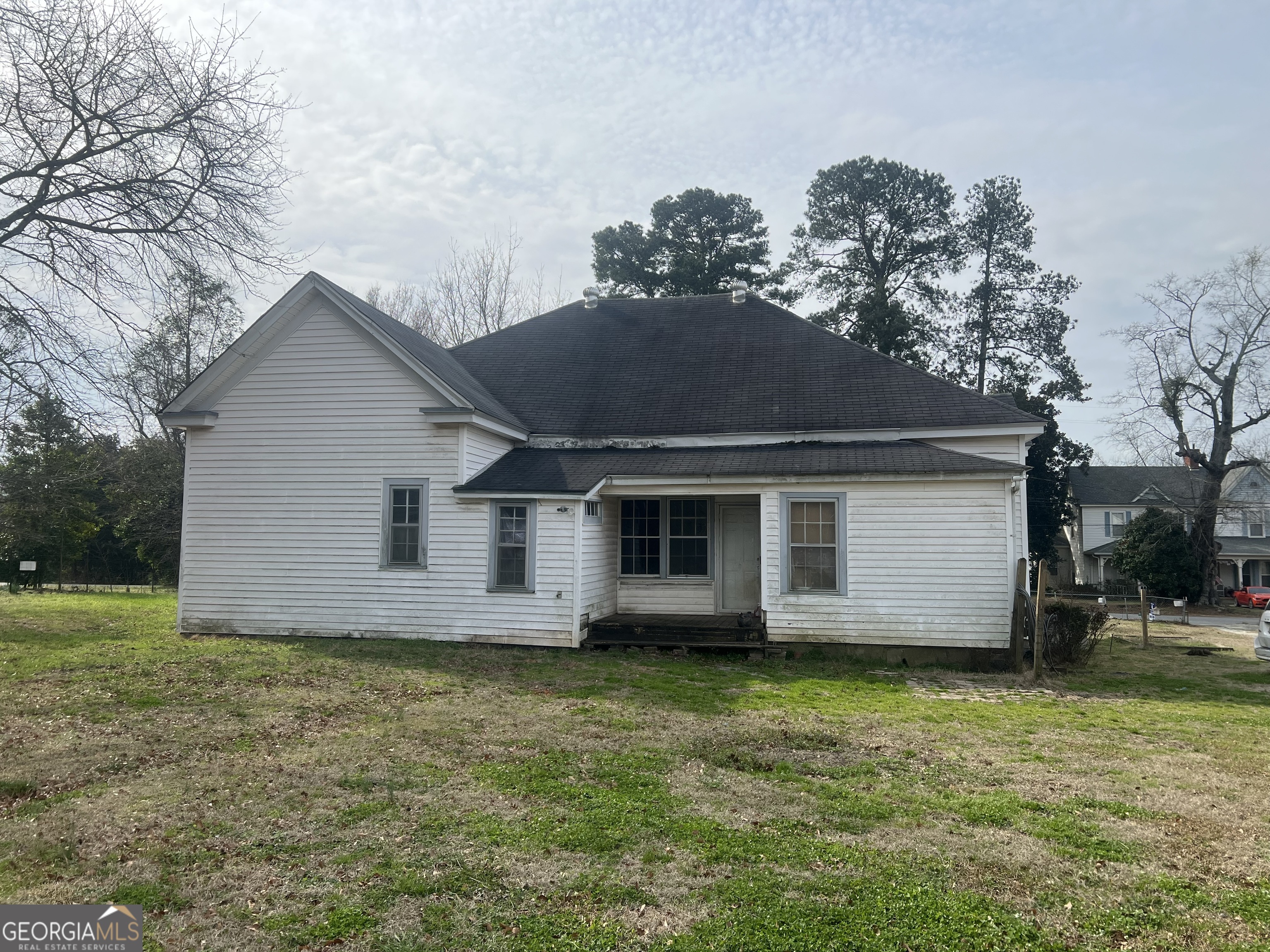 179 Independence Street Tignall, GA 30668 - Photo 16 of 21 a view of a house with a yard
