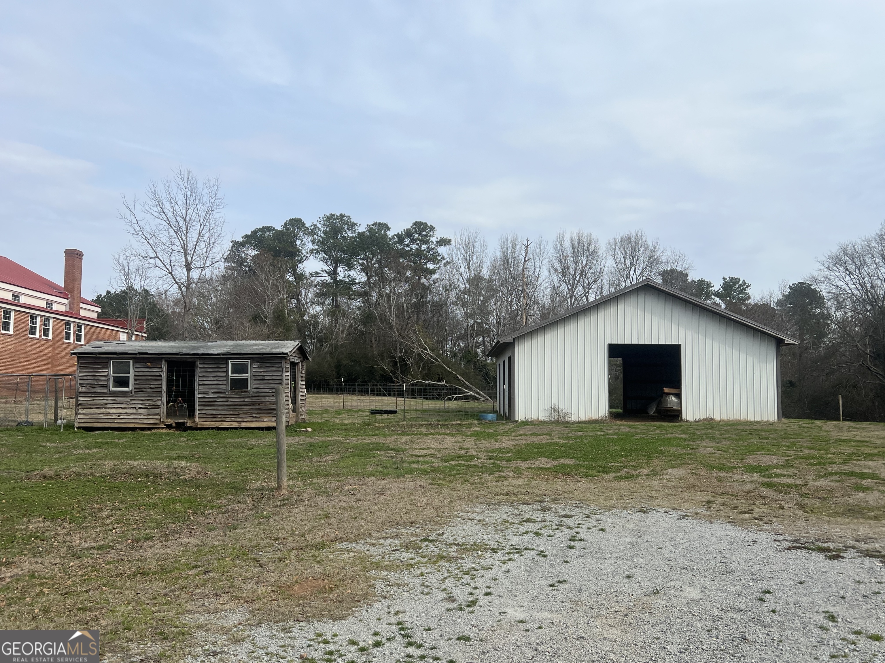 179 Independence Street Tignall, GA 30668 - Photo 17 of 21 a house with a yard