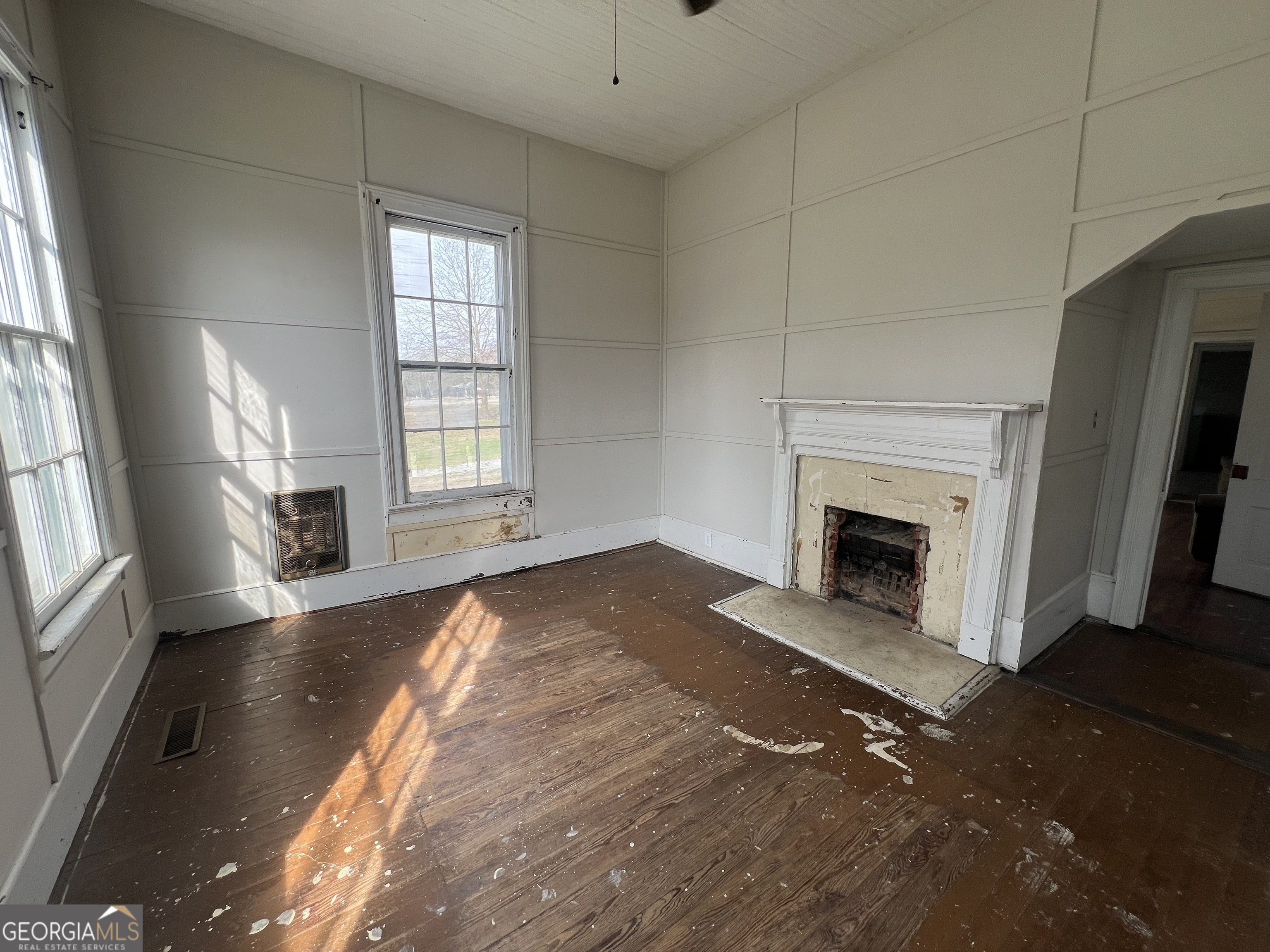 179 Independence Street Tignall, GA 30668 - Photo 4 of 21 a view of a livingroom with a fireplace