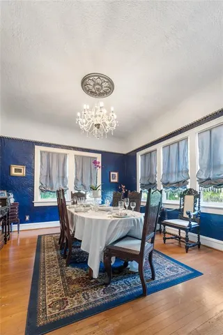 a view of a dining room with furniture