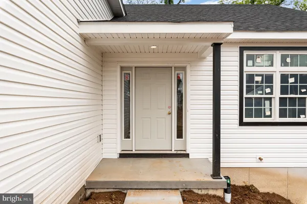 a view of a house with wooden door
