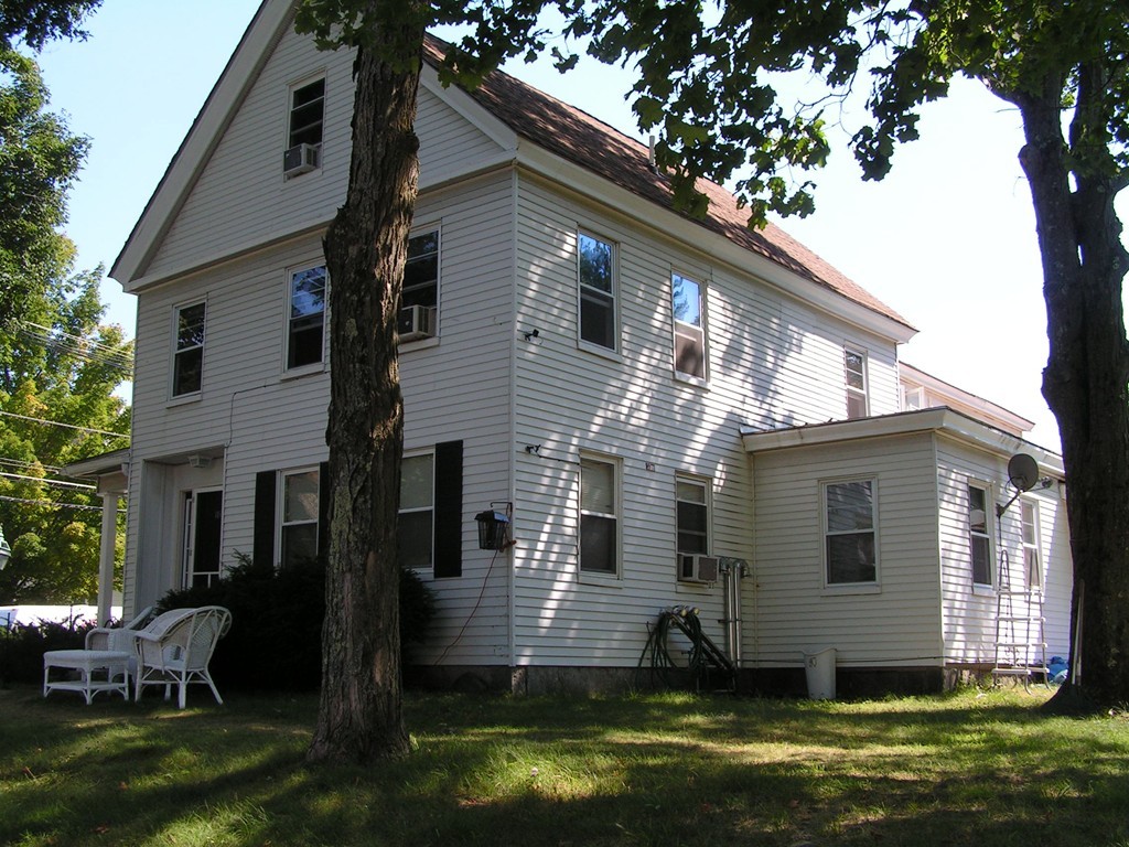 1 Lancaster Road Shirley, MA 01464 - Photo 1 of 30 a front view of house with yard
