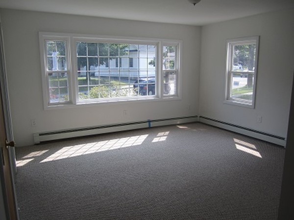 1 Lancaster Road Shirley, MA 01464 - Photo 3 of 30 an empty room with a window