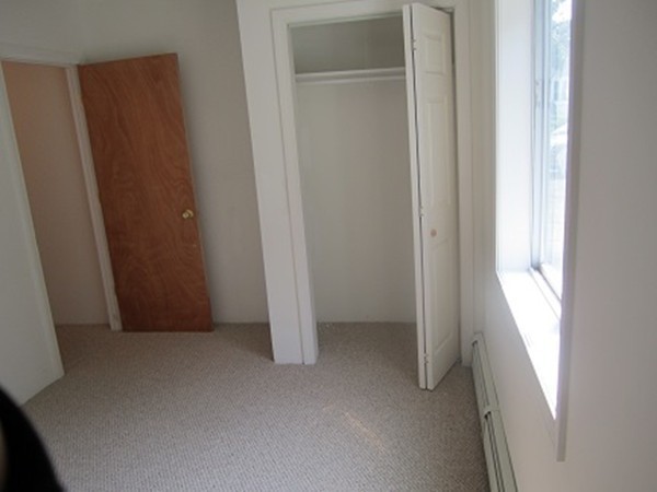 1 Lancaster Road Shirley, MA 01464 - Photo 8 of 30 a view of an empty room and a window