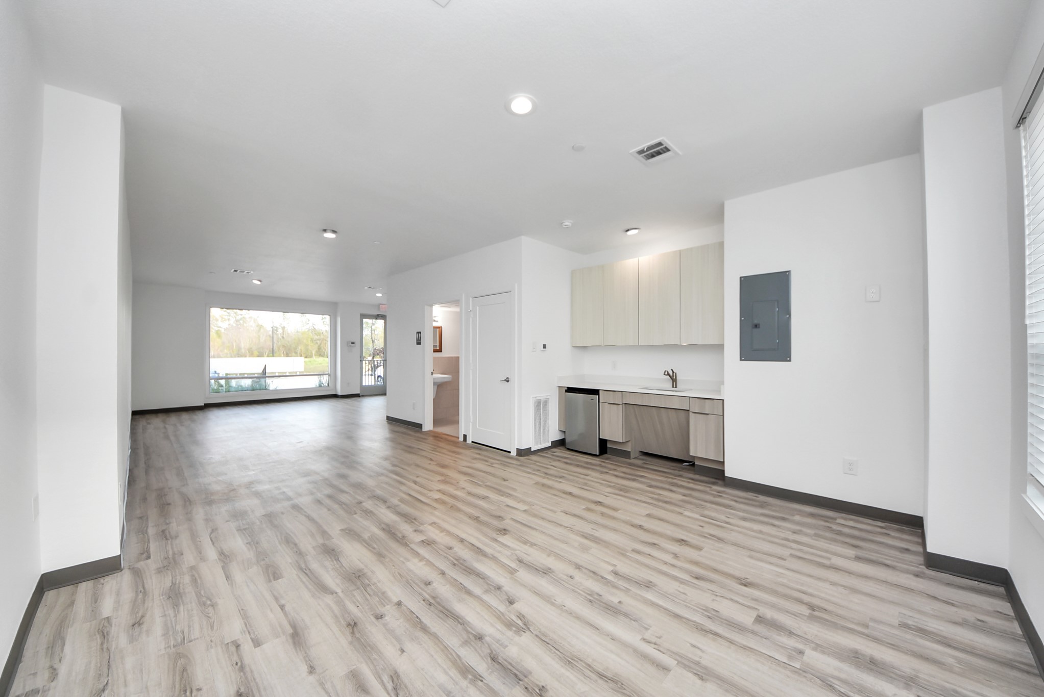 18716 Centro Main Street Conroe, TX 77385 - Photo 50 of 50 Alternate view of the commercial space highlighting the open floor plan, recessed lighting, and flexible configuration for multiple business uses.
