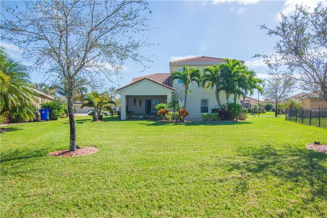 a view of a room with furniture and a yard